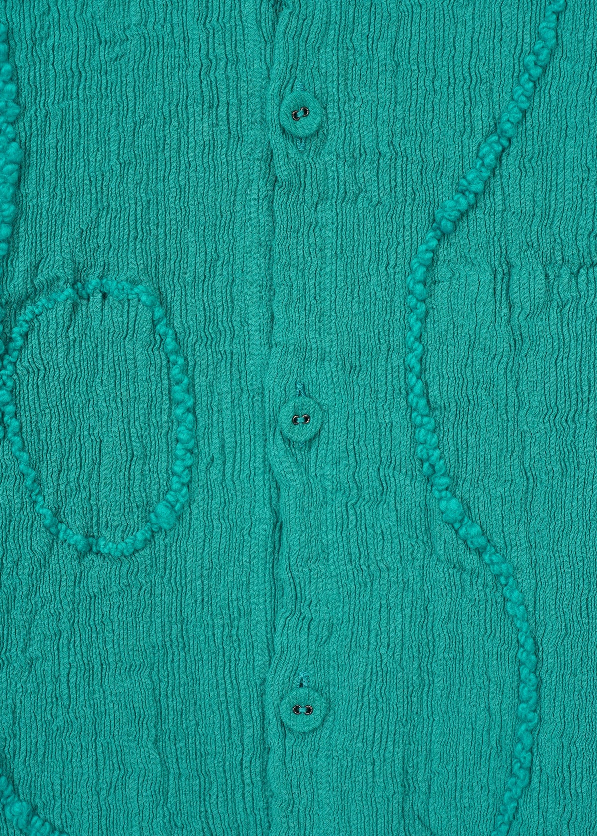 A detail shot of the HAAT KYO CHIJIMI EMB jacket.