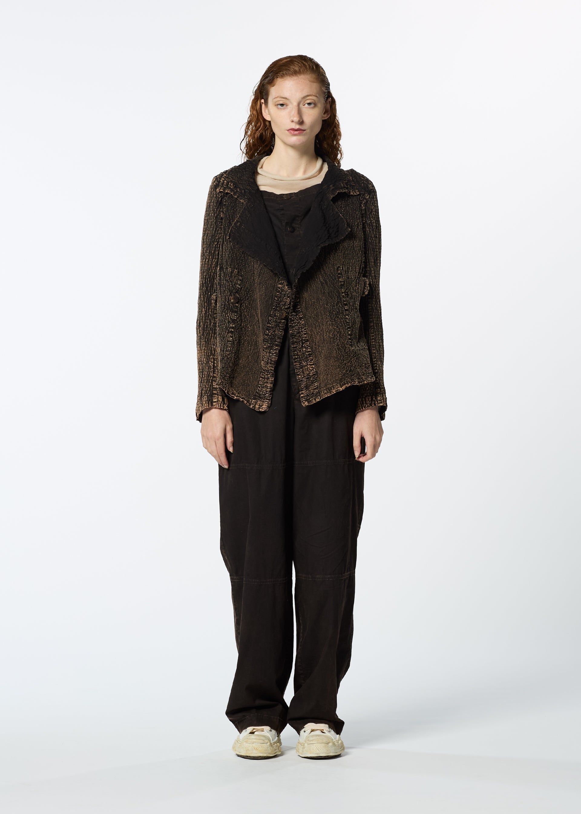 A model wears the HAAT TENMOKU COTTON jacket.