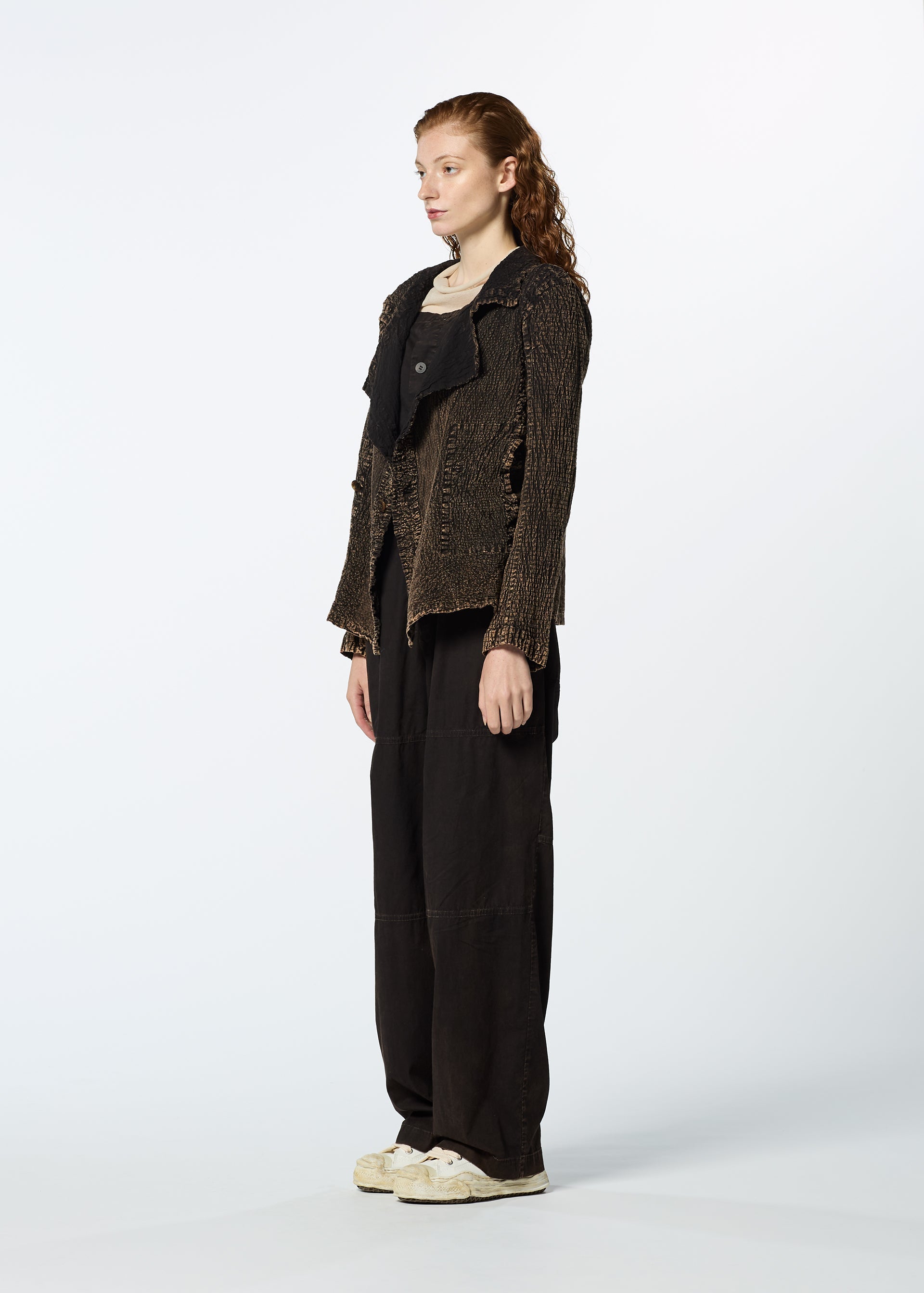 A model wears the HAAT TENMOKU COTTON jacket.