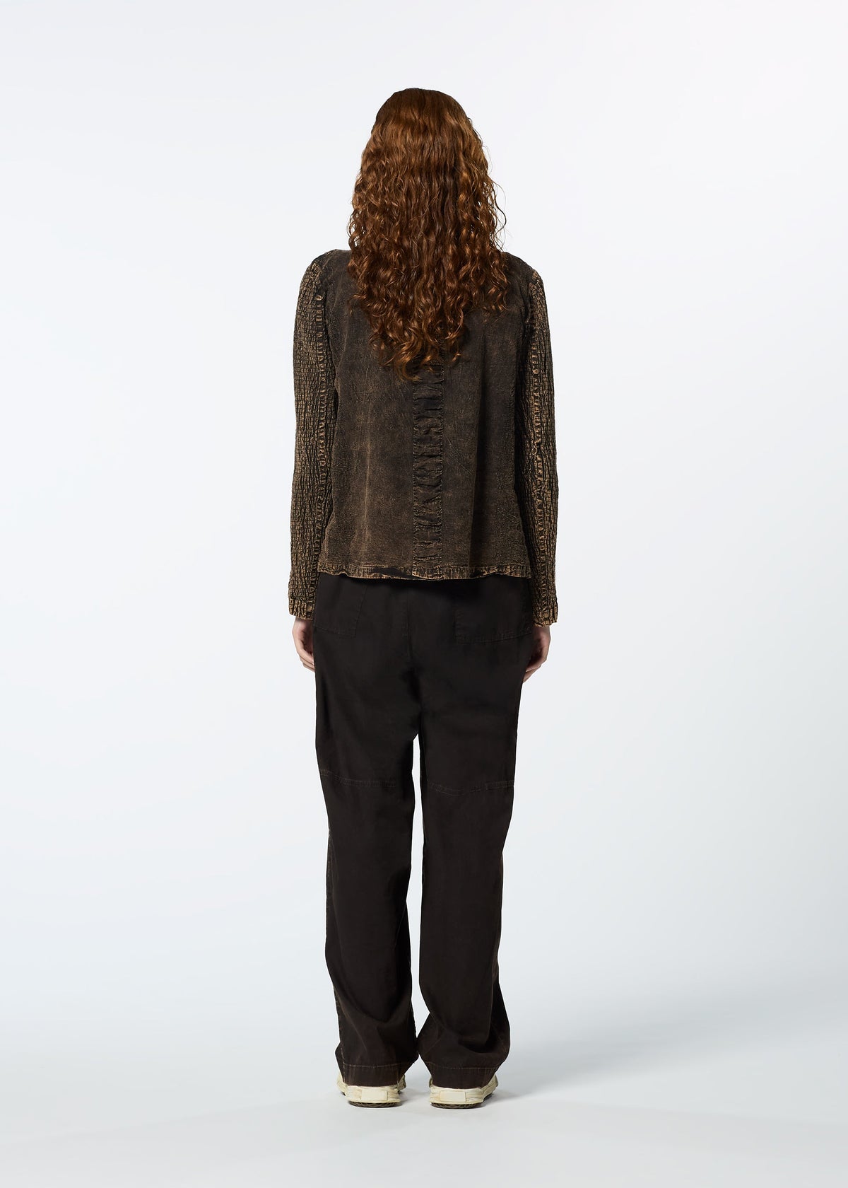 A model wears the HAAT TENMOKU COTTON jacket.