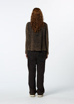 A model wears the HAAT TENMOKU COTTON jacket.