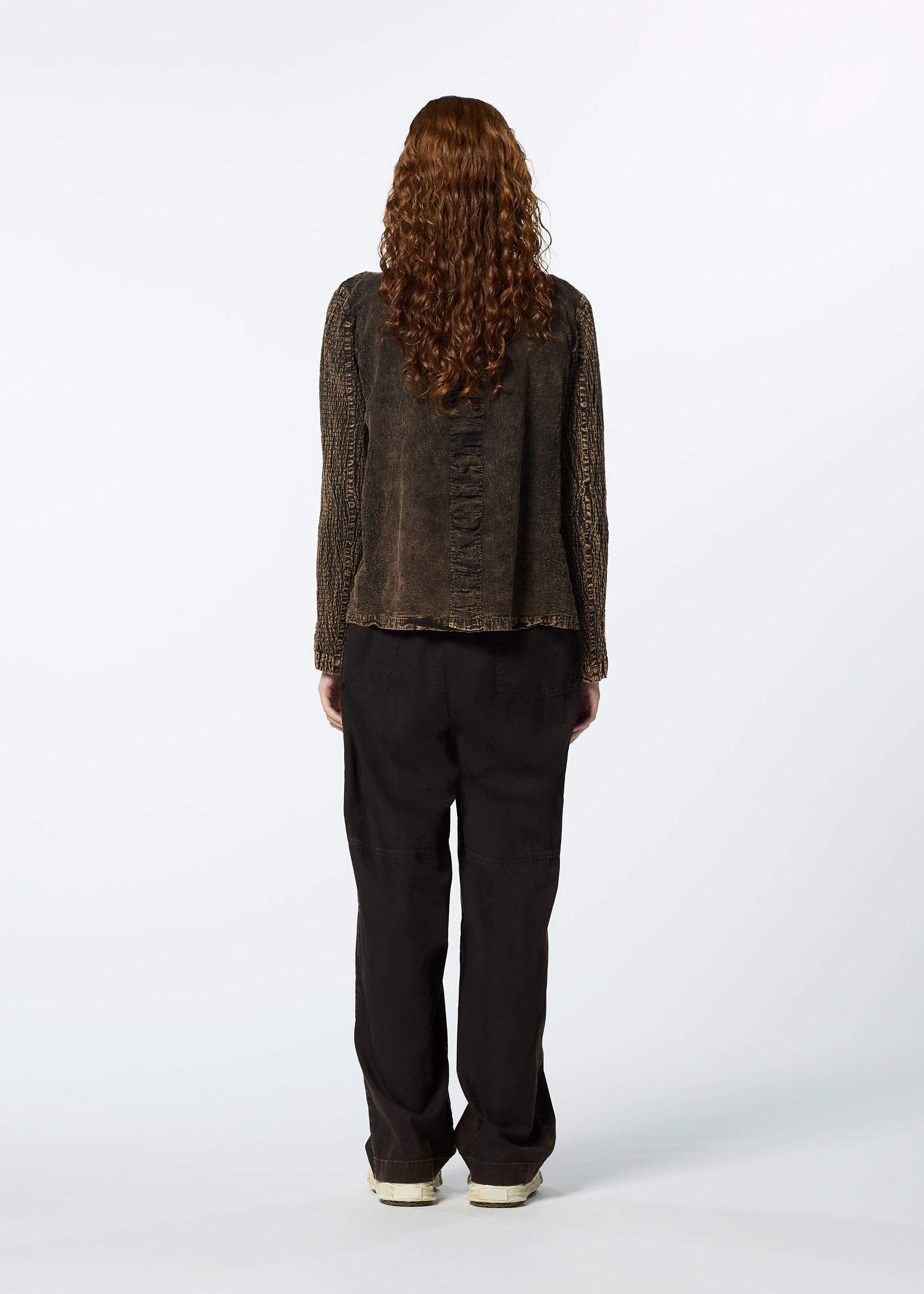 A model wears the HAAT TENMOKU COTTON jacket.
