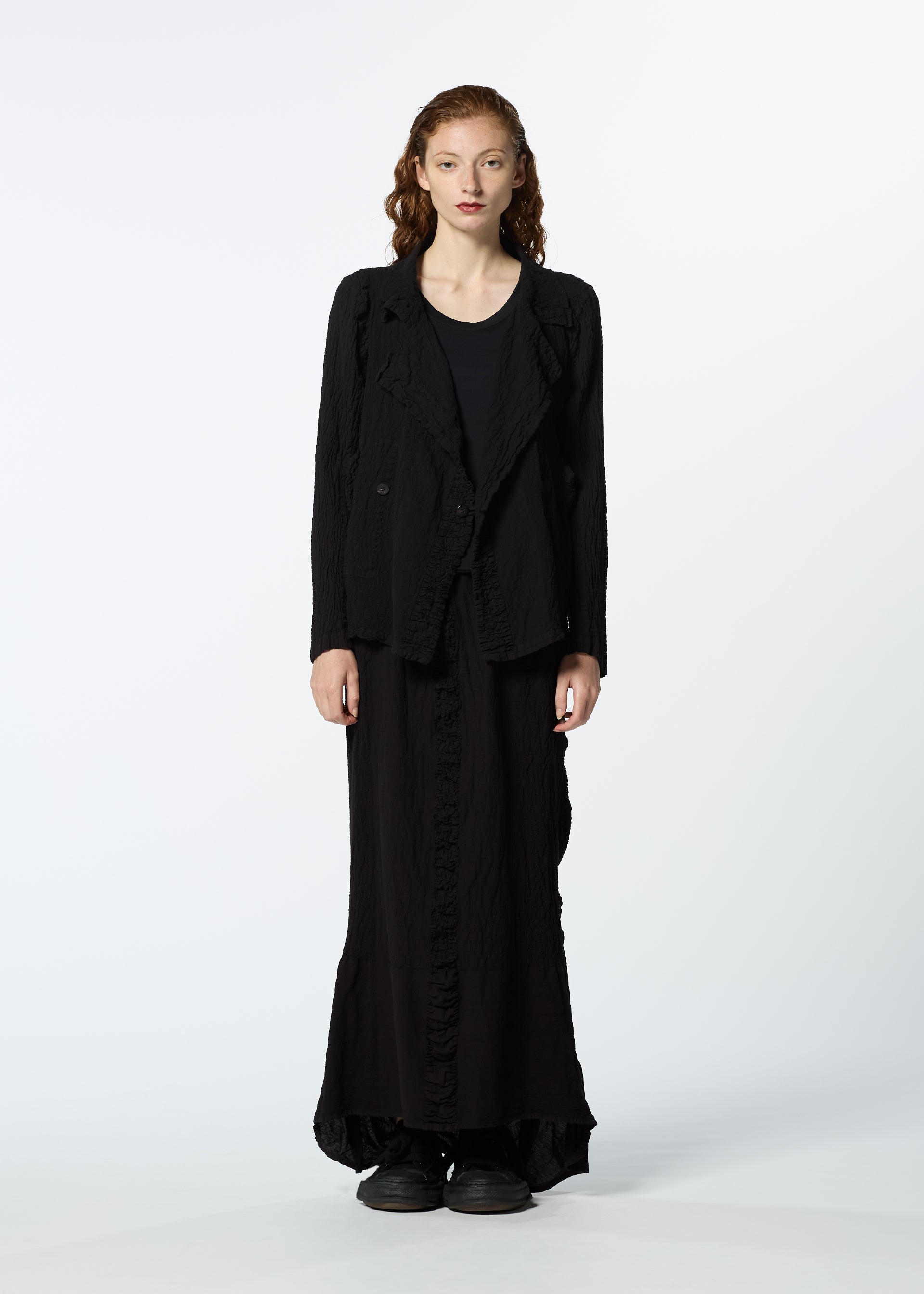 A model wears the HAAT TENMOKU COTTON jacket.