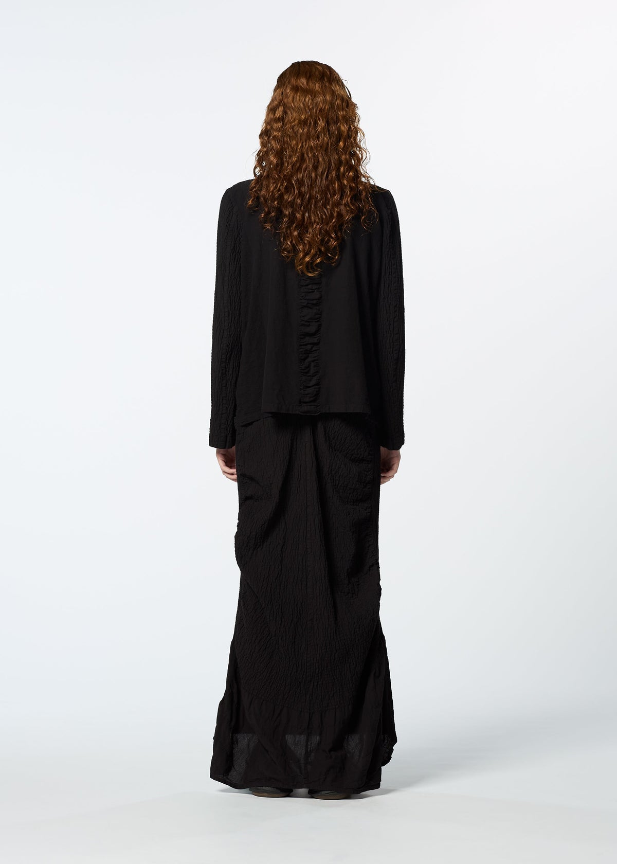 A model wears the HAAT TENMOKU COTTON jacket.