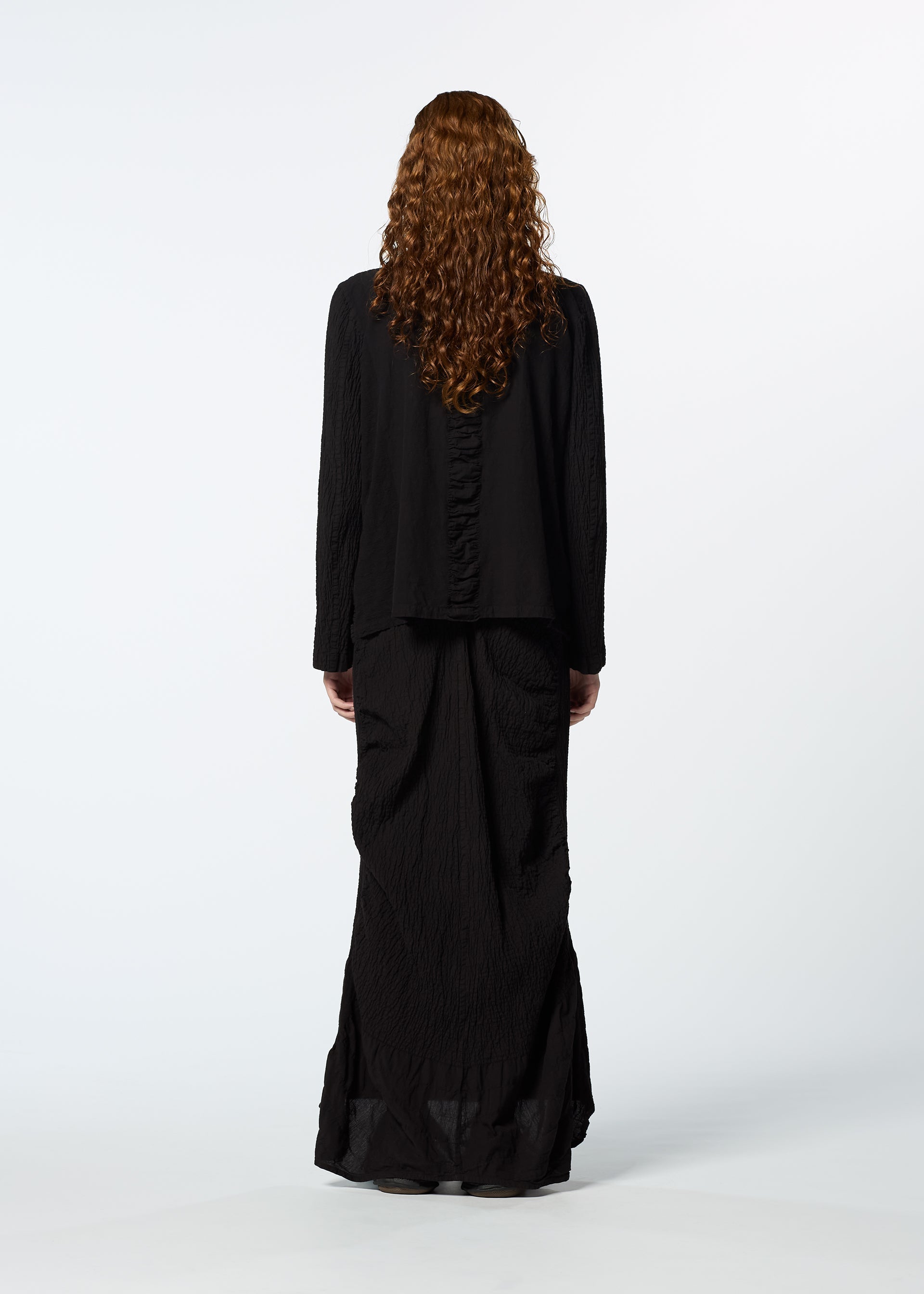 A model wears the HAAT TENMOKU COTTON jacket.