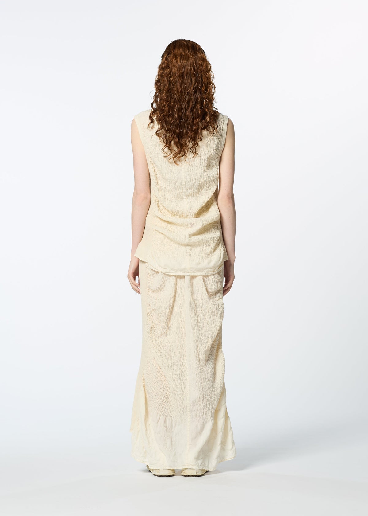 A model wears the HAAT TENMOKU COTTON vest.