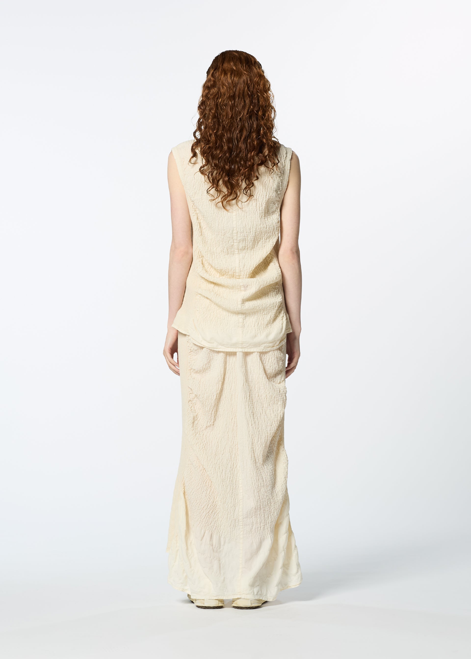 A model wears the HAAT TENMOKU COTTON vest.