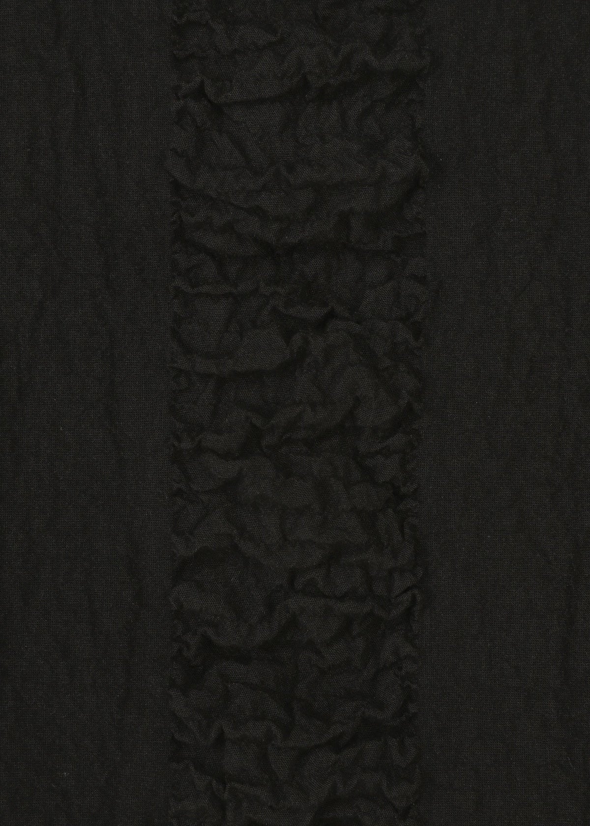 A detail shot of the HAAT TENMOKU COTTON vest.