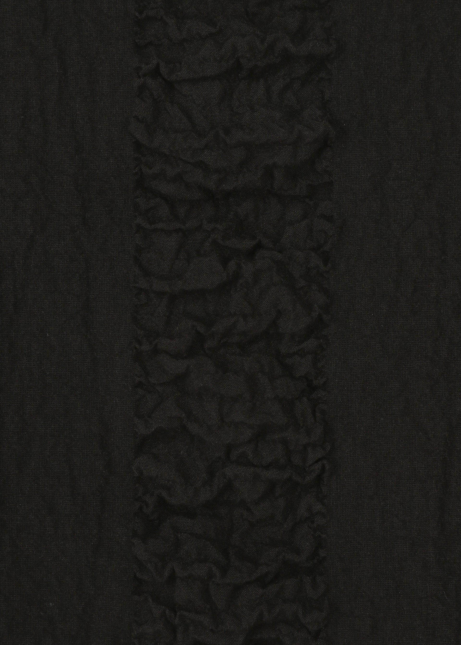 A detail shot of the HAAT TENMOKU COTTON vest.
