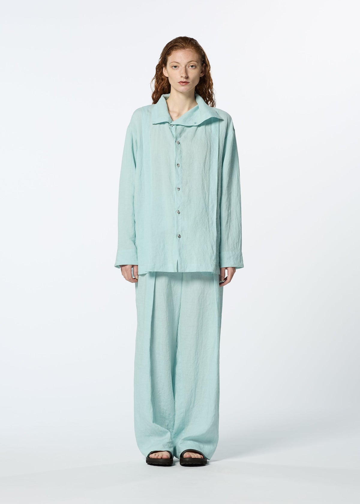 A model wears the HAAT JIKI trousers.