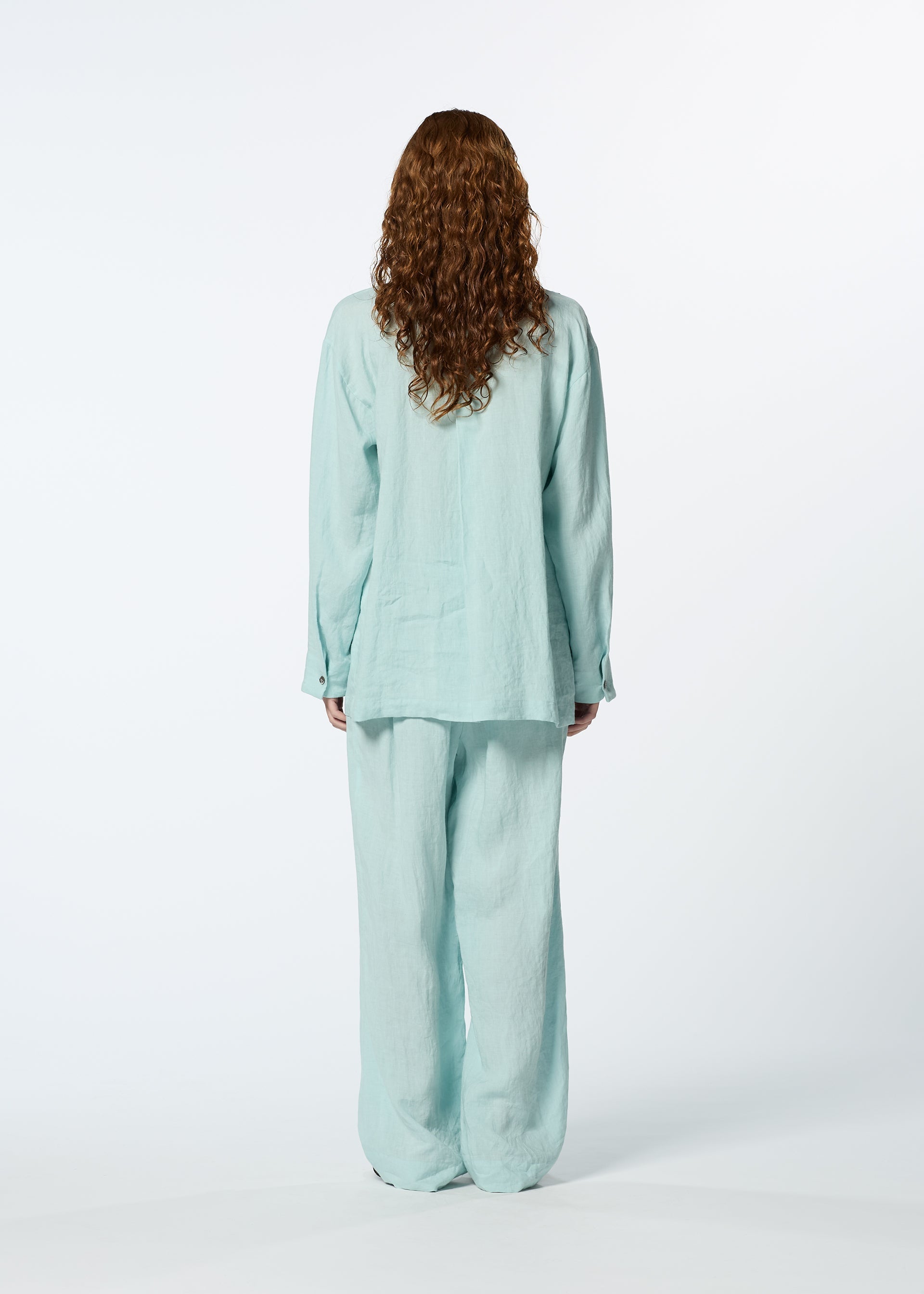 A model wears the HAAT JIKI trousers.