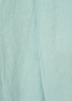 A detail shot of the HAAT JIKI trousers.