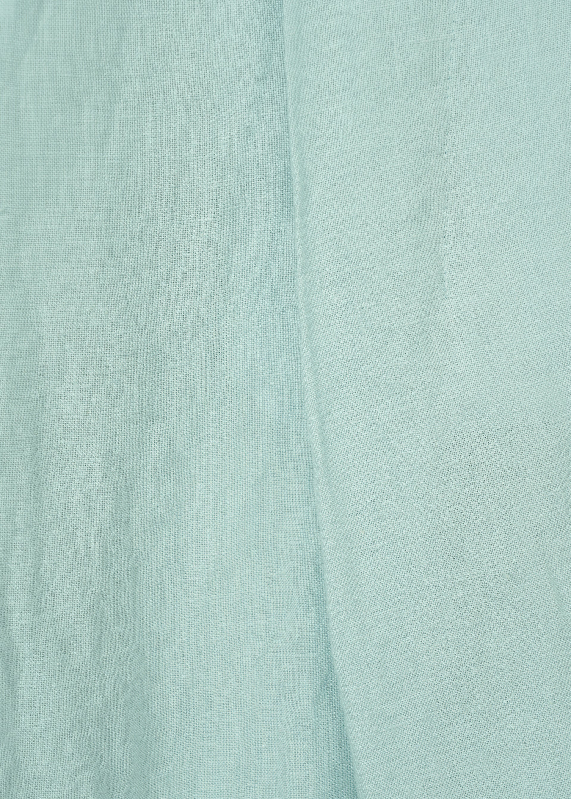 A detail shot of the HAAT JIKI trousers.