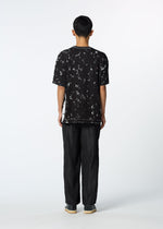 A model wears the HaaT SHIBARI BOTTOM shibari-bottom-trousers-khaki.