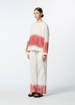 A model wears the HaaT SAZANAMI sazanami-trousers-red.