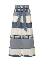 A product shot of the HAAT KASANEGAKE trousers in blue (72).