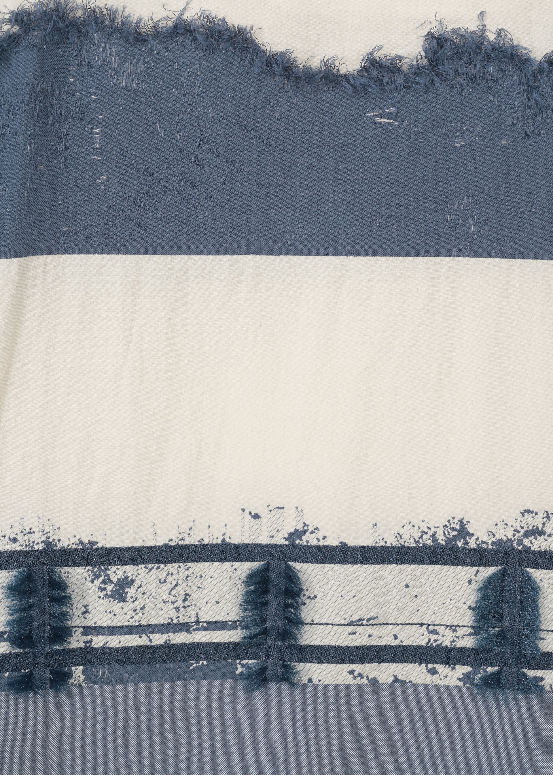 A detail shot of the HAAT KASANEGAKE trousers.