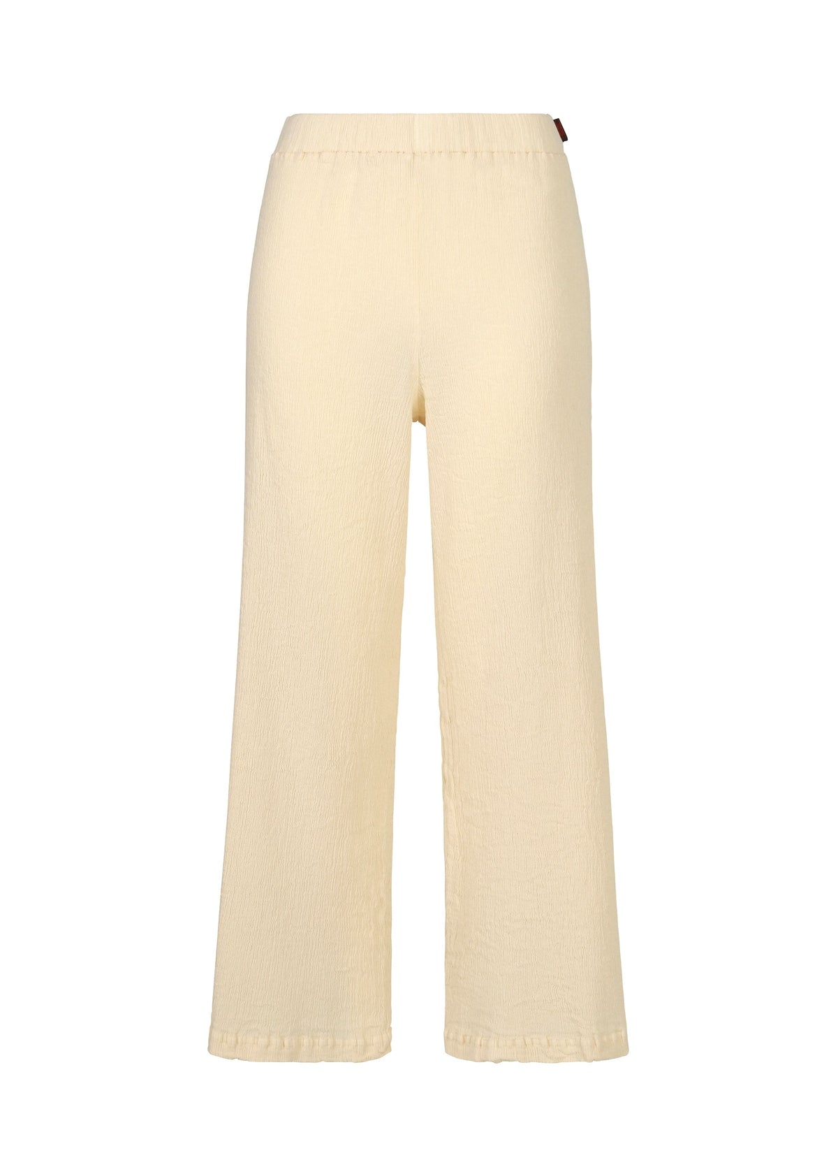 A product shot of the HAAT KYO CHIJIMI ITAJIME trousers in ivory (03).