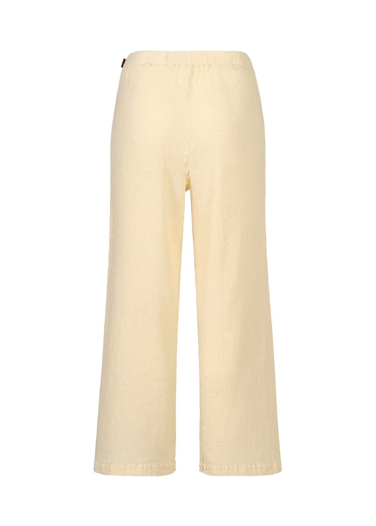 A detail shot of the HAAT KYO CHIJIMI ITAJIME trousers.