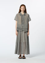 A model wears the HAAT 2 SIDE PINTUCKING skirt.