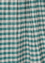 A detail shot of the HAAT 2 SIDE PINTUCKING skirt.