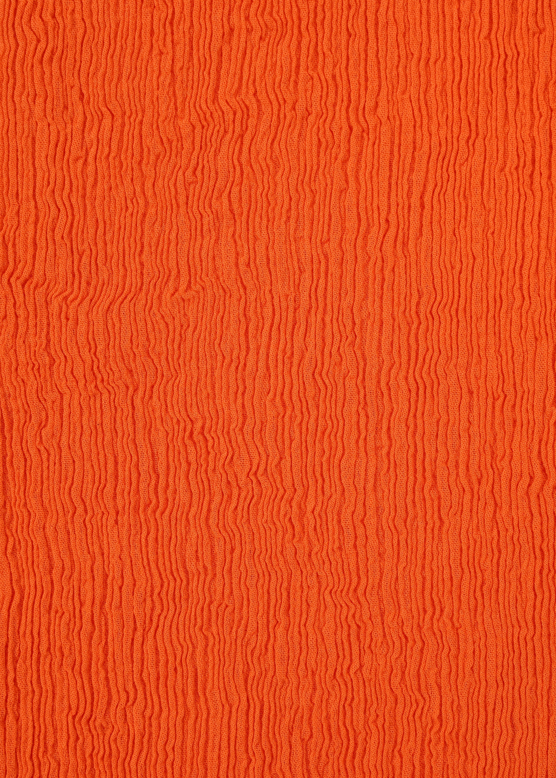 A detail shot of the HAAT KYO CHIJIMI MAY skirt.