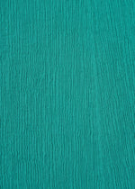 A detail shot of the HAAT KYO CHIJIMI EMB skirt.