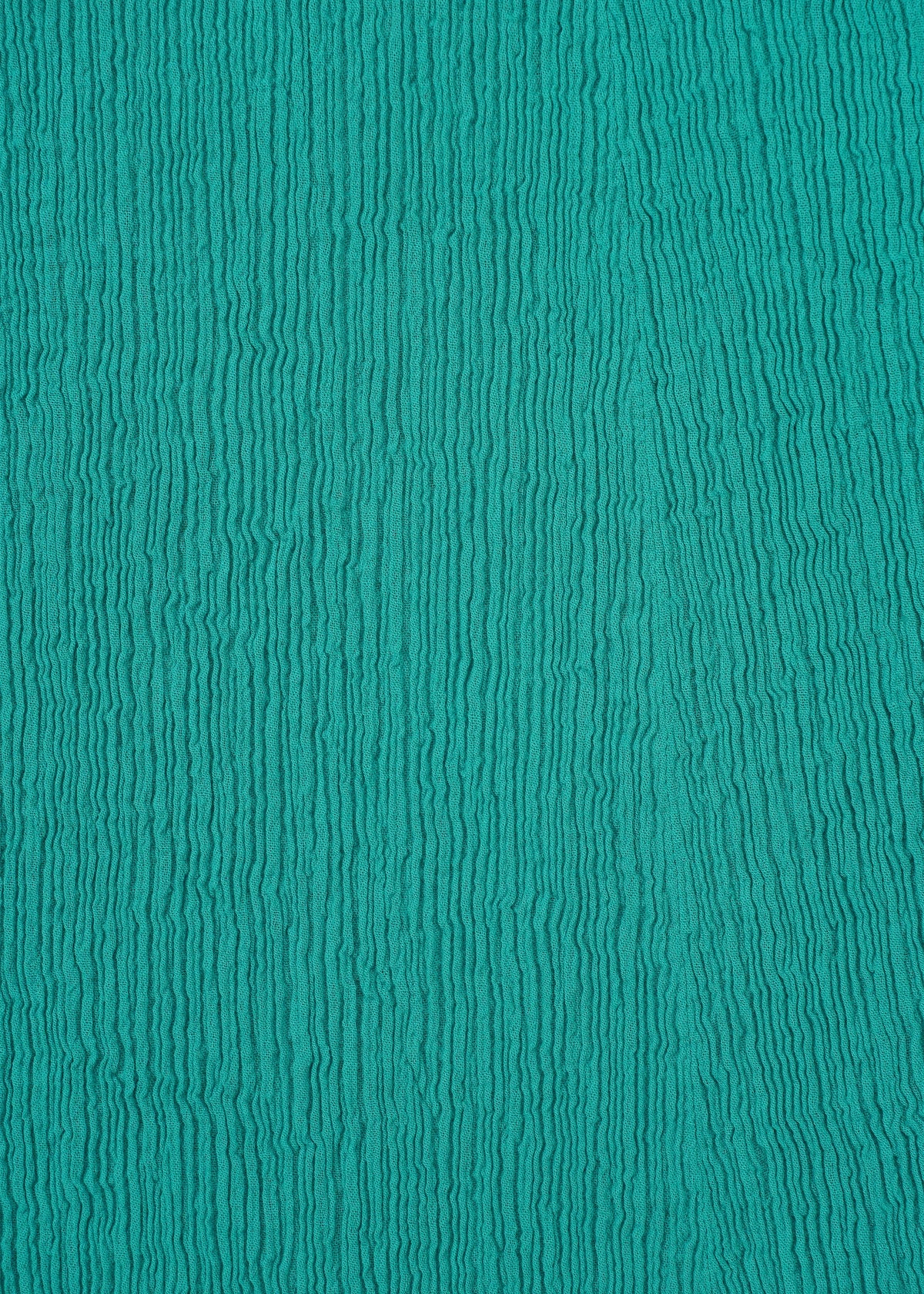 A detail shot of the HAAT KYO CHIJIMI EMB skirt.