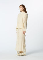A model wears the HAAT TENMOKU COTTON skirt.