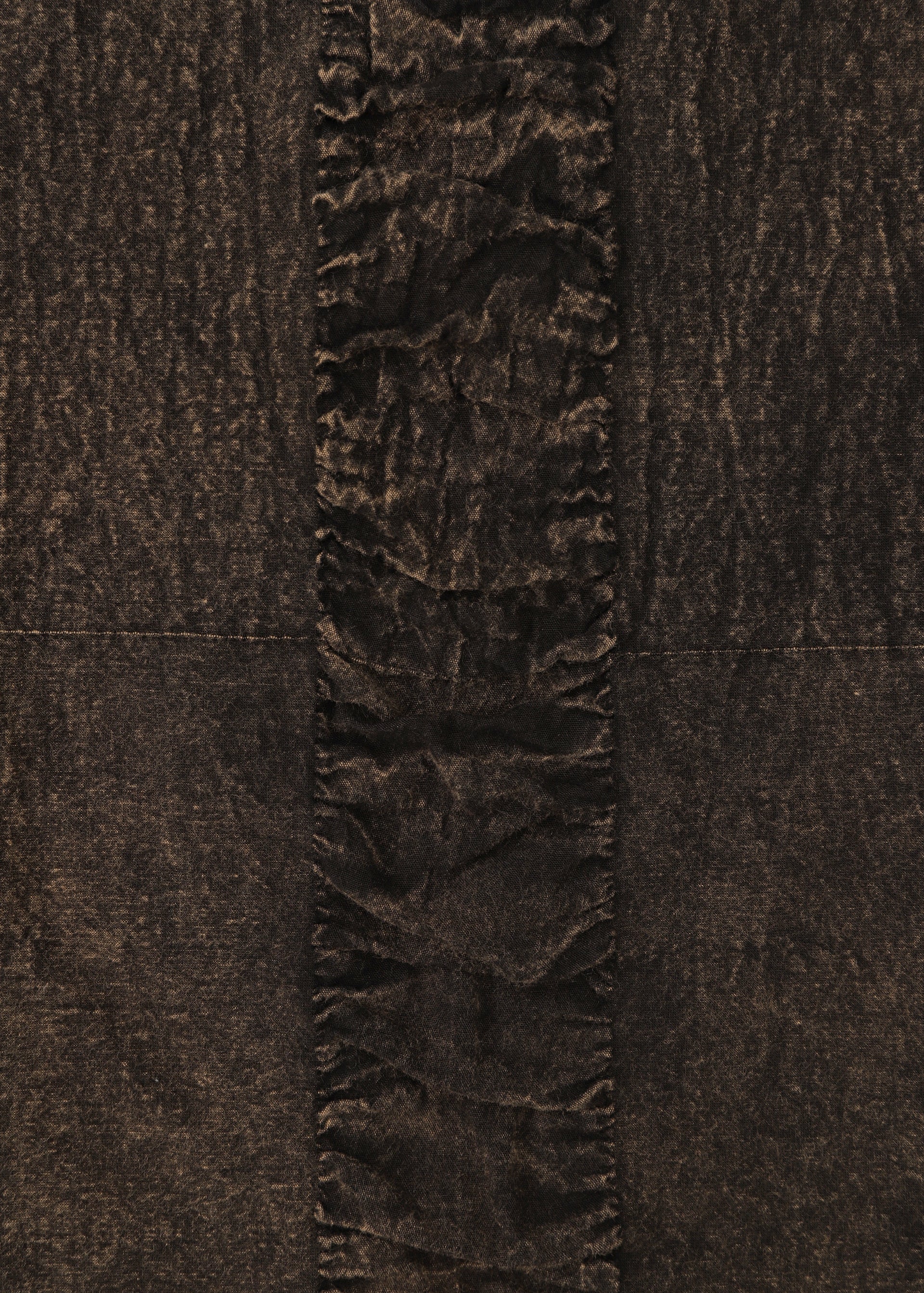 A detail shot of the HAAT TENMOKU COTTON skirt.