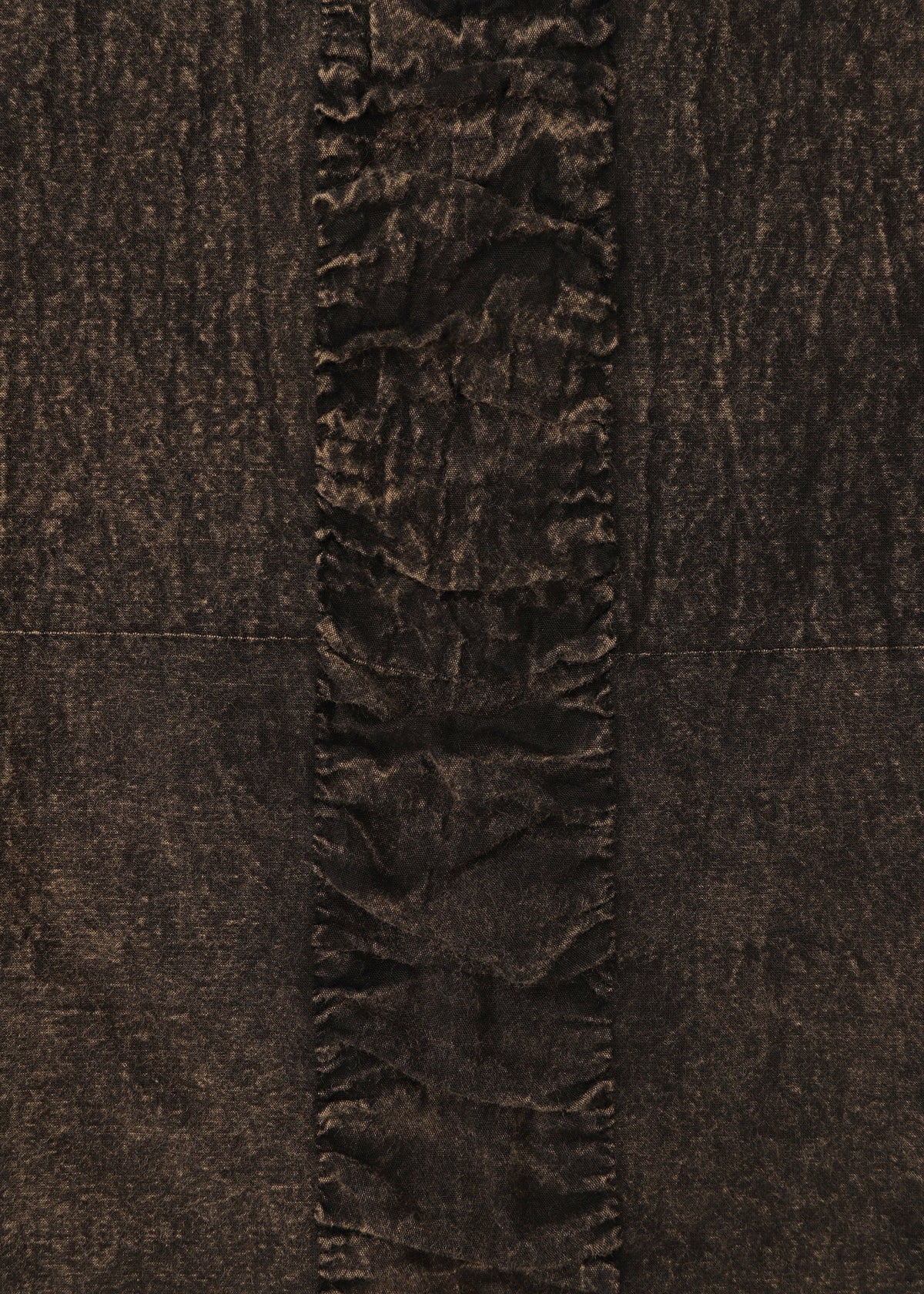 A detail shot of the HAAT TENMOKU COTTON skirt.
