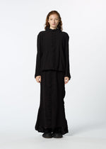 A model wears the HAAT TENMOKU COTTON skirt.