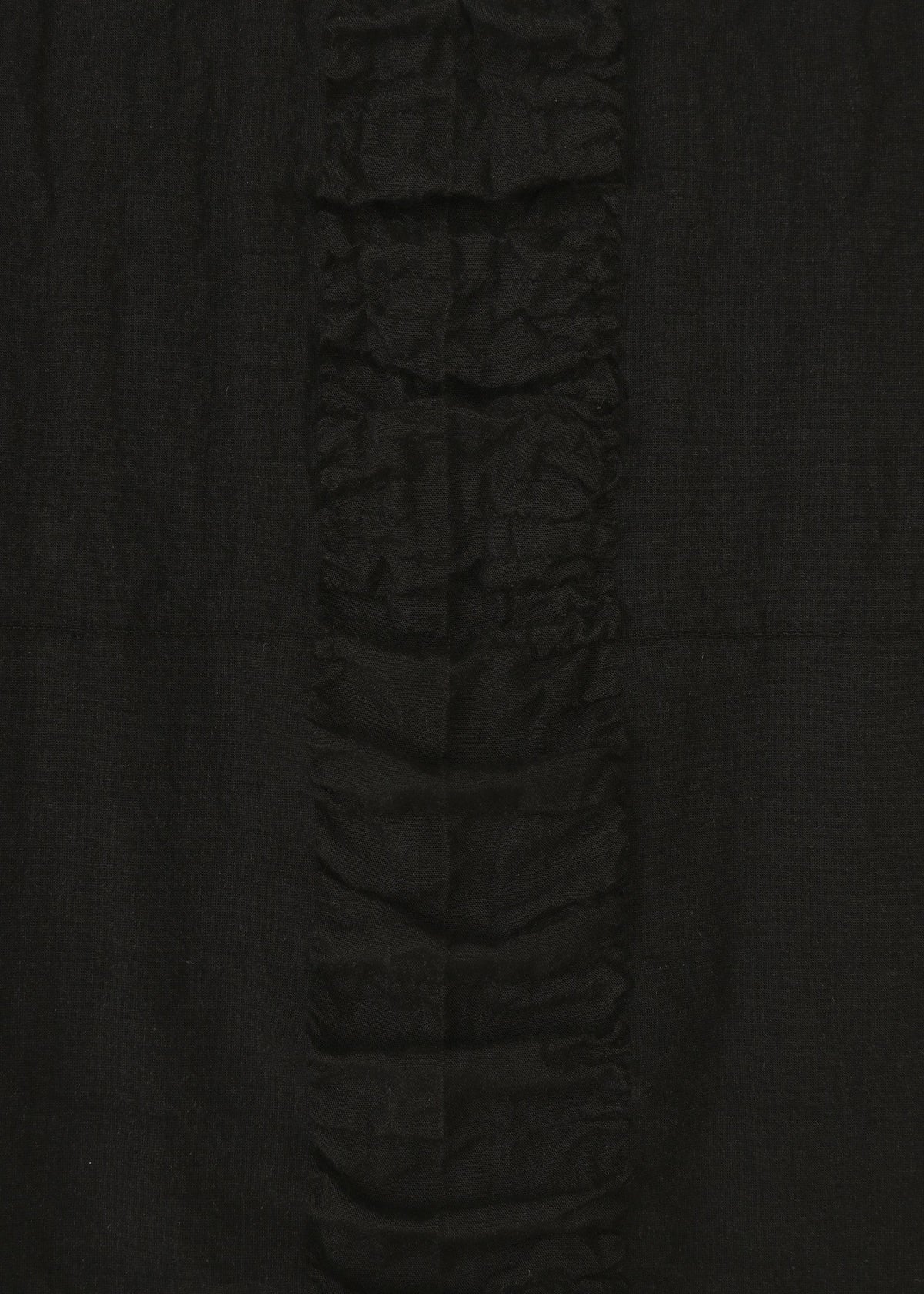 A detail shot of the HAAT TENMOKU COTTON skirt.