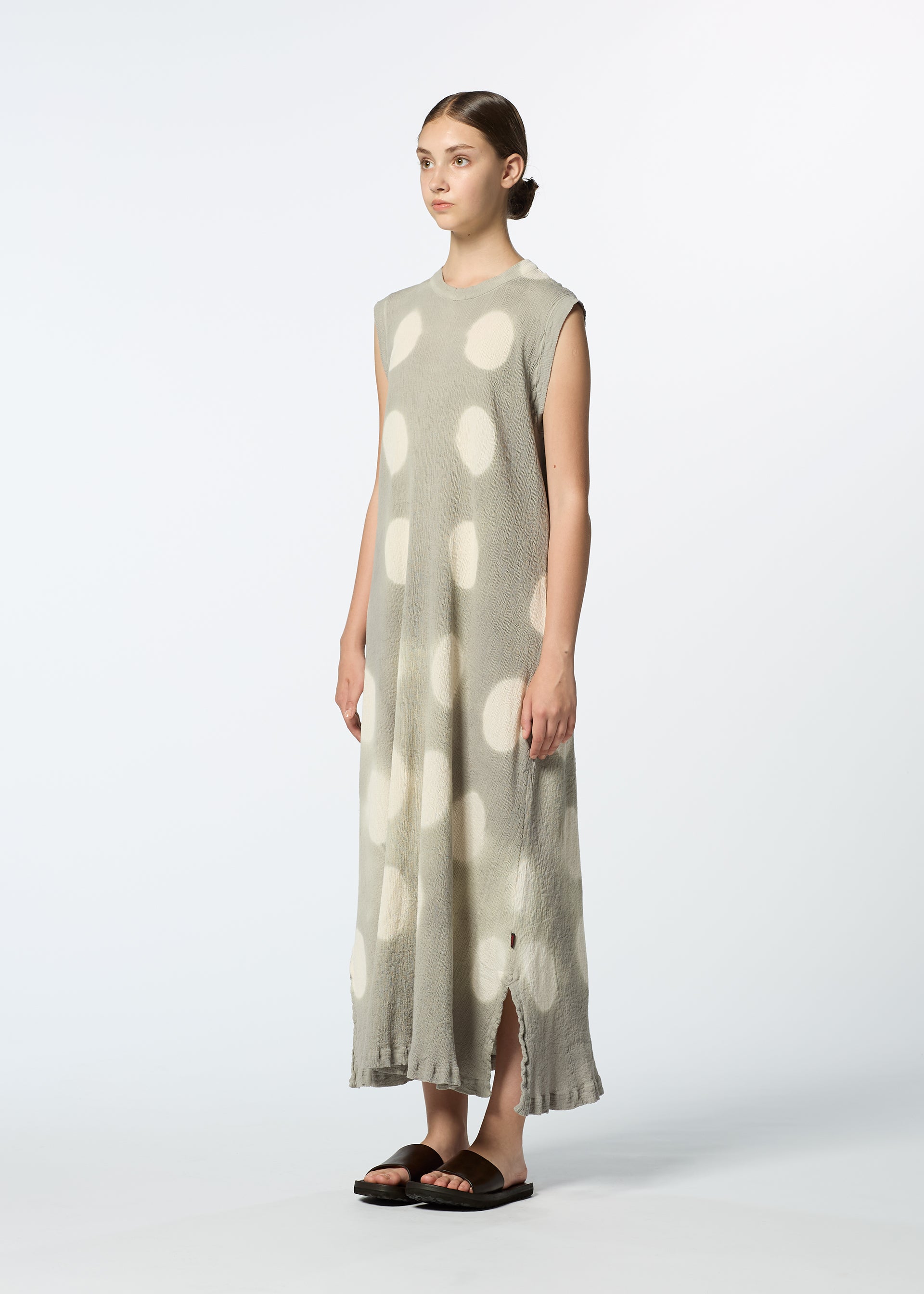 A model wears the HAAT KYO CHIJIMI ITAJIME dress.