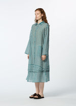 A model wears the HAAT 2 SIDE PINTUCKING dress.