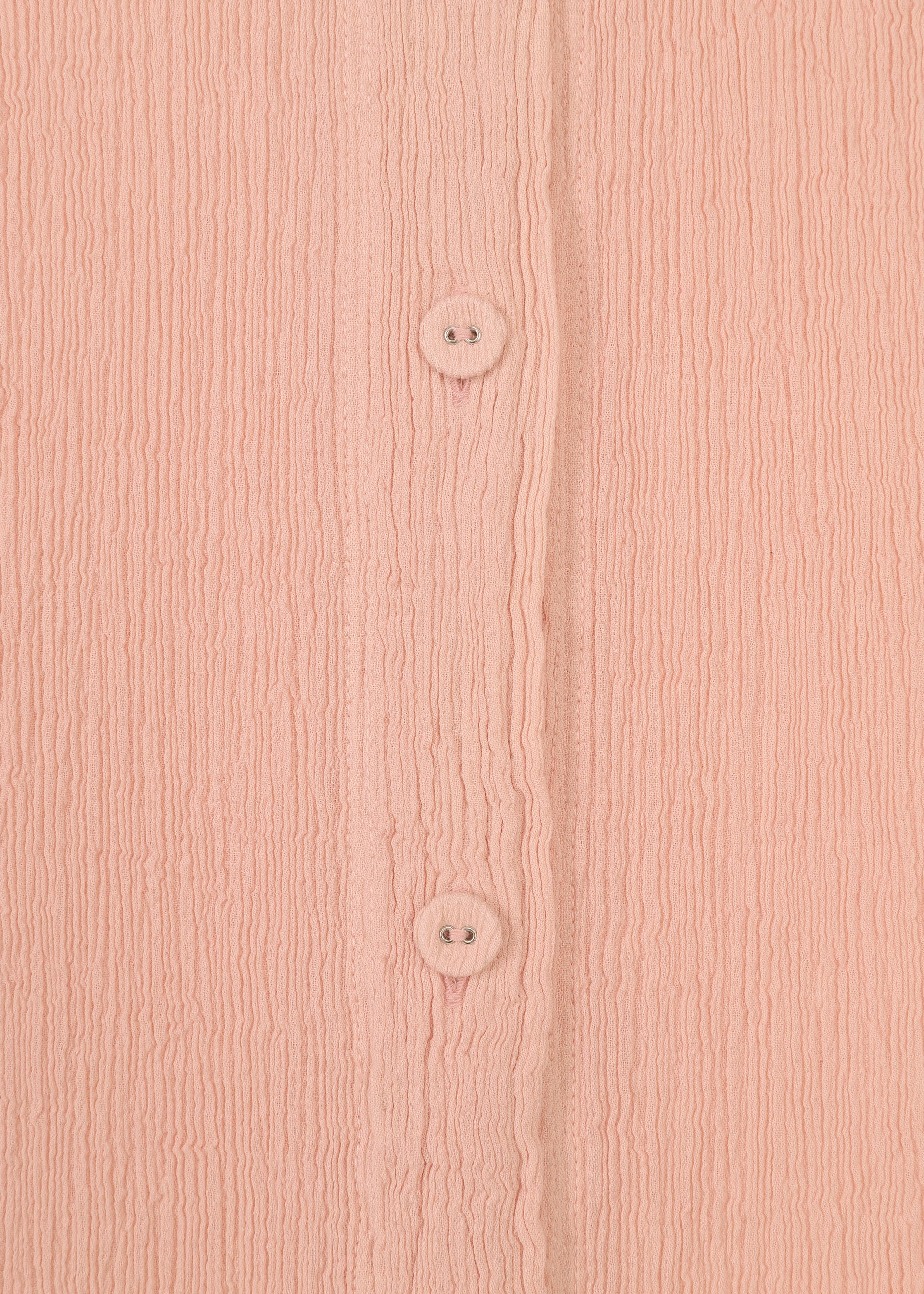 A detail shot of the HAAT KYO CHIJIMI FEBRUARY dress.