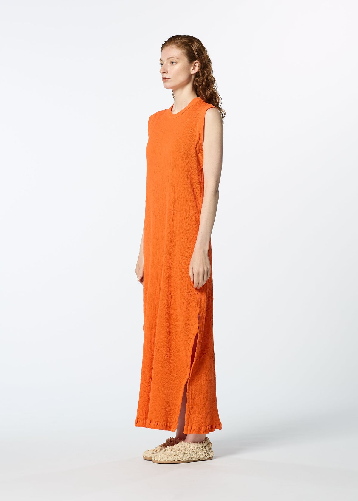 A model wears the HAAT KYO CHIJIMI MAY dress.