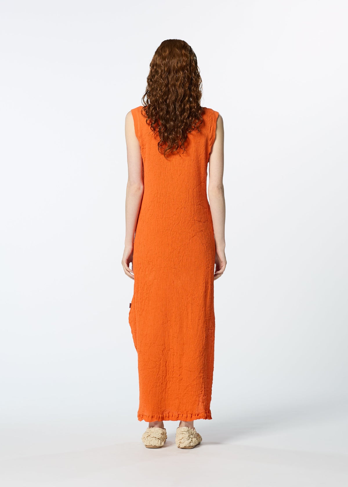 A model wears the HAAT KYO CHIJIMI MAY dress.