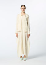 A model wears the HAAT KYO CHIJIMI EMB dress.