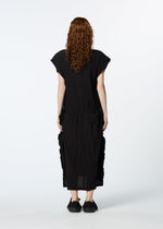 A model wears the HAAT TENMOKU COTTON dress.