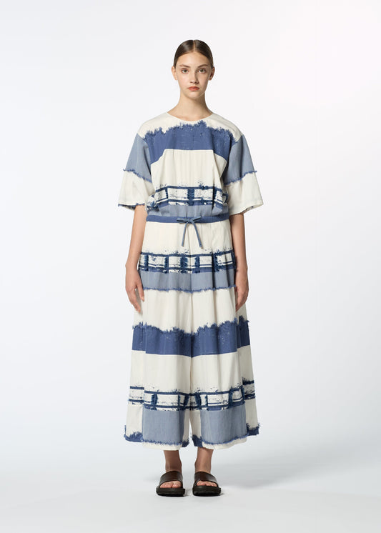 A model wears the HAAT KASANEGAKE jumpsuit.