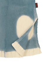 A detail shot of the HAAT KYO CHIJIMI ITAJIME shirt.