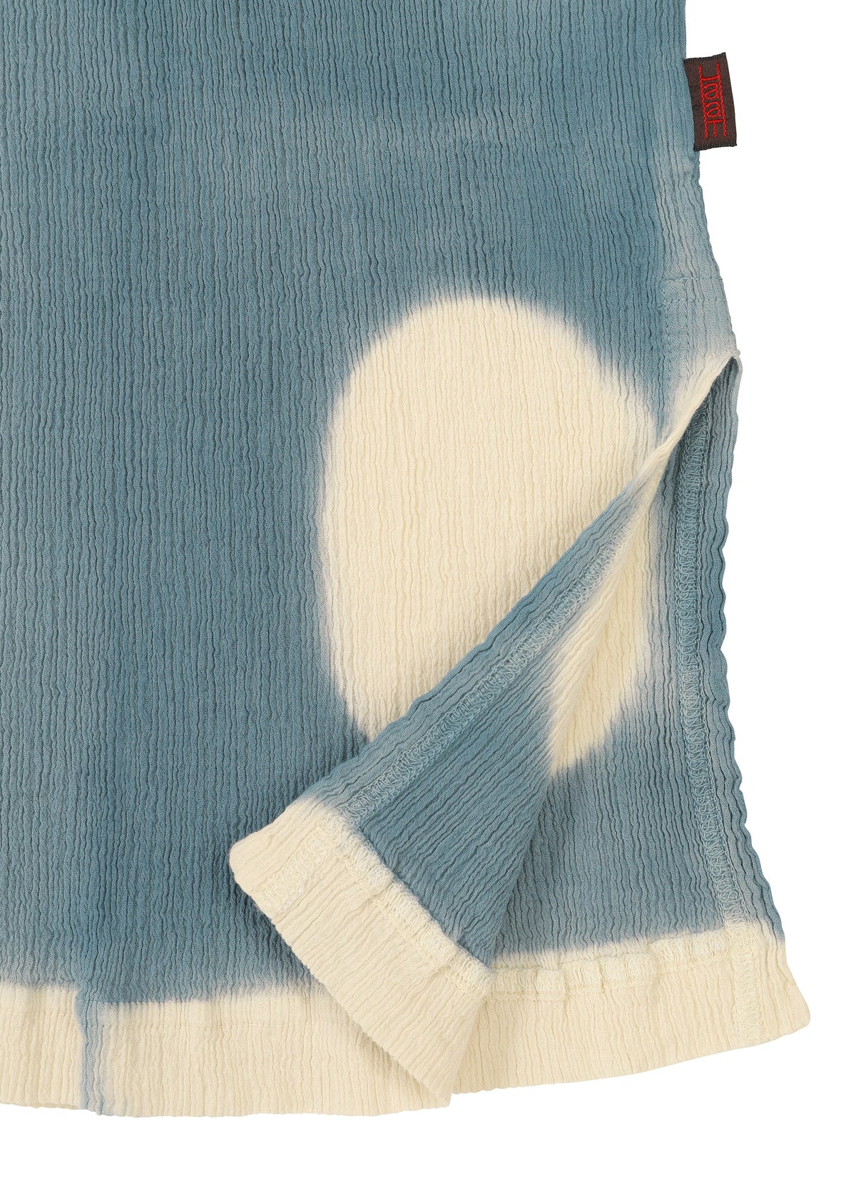 A detail shot of the HAAT KYO CHIJIMI ITAJIME shirt.