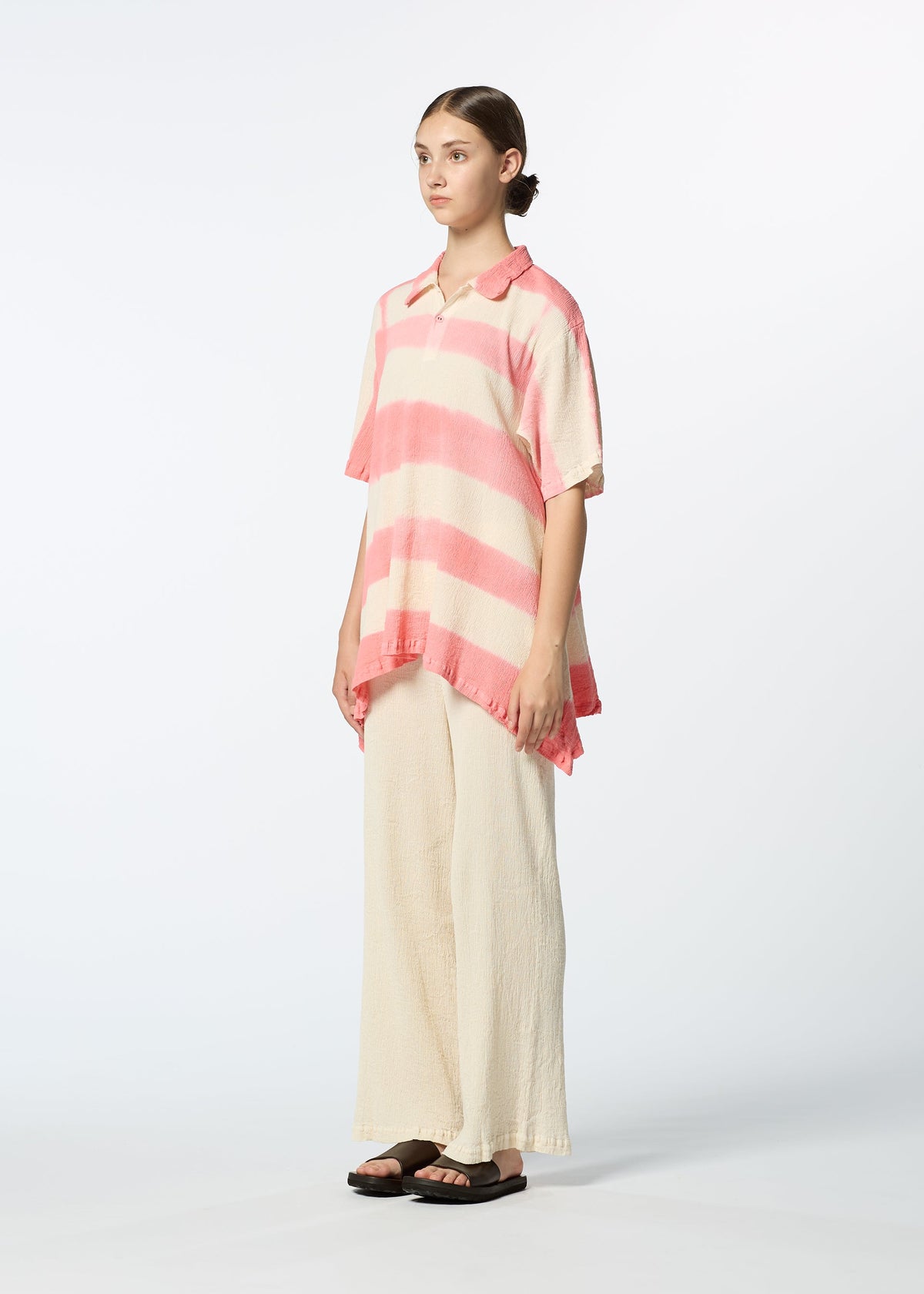 A model wears the HAAT KYO CHIJIMI ITAJIME shirt.