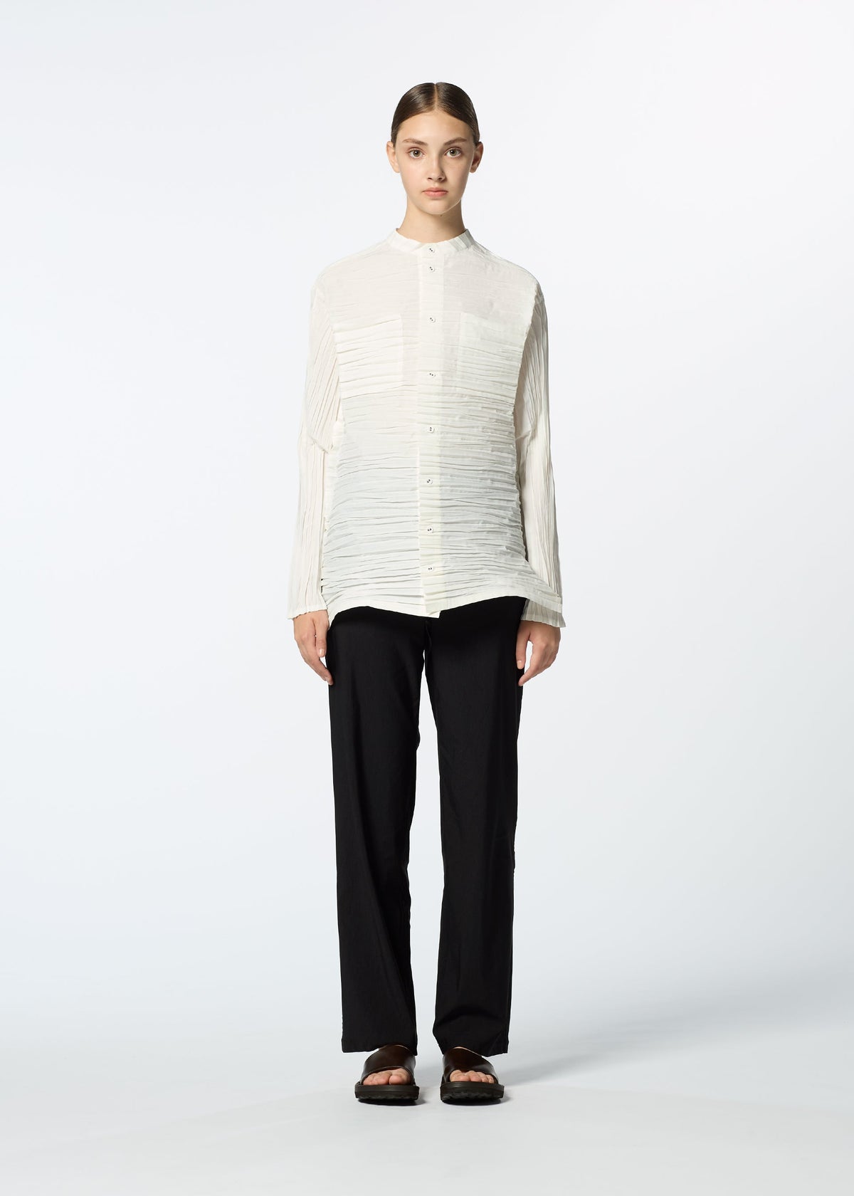 A model wears the HAAT SHIBARI SHIRT shirt.
