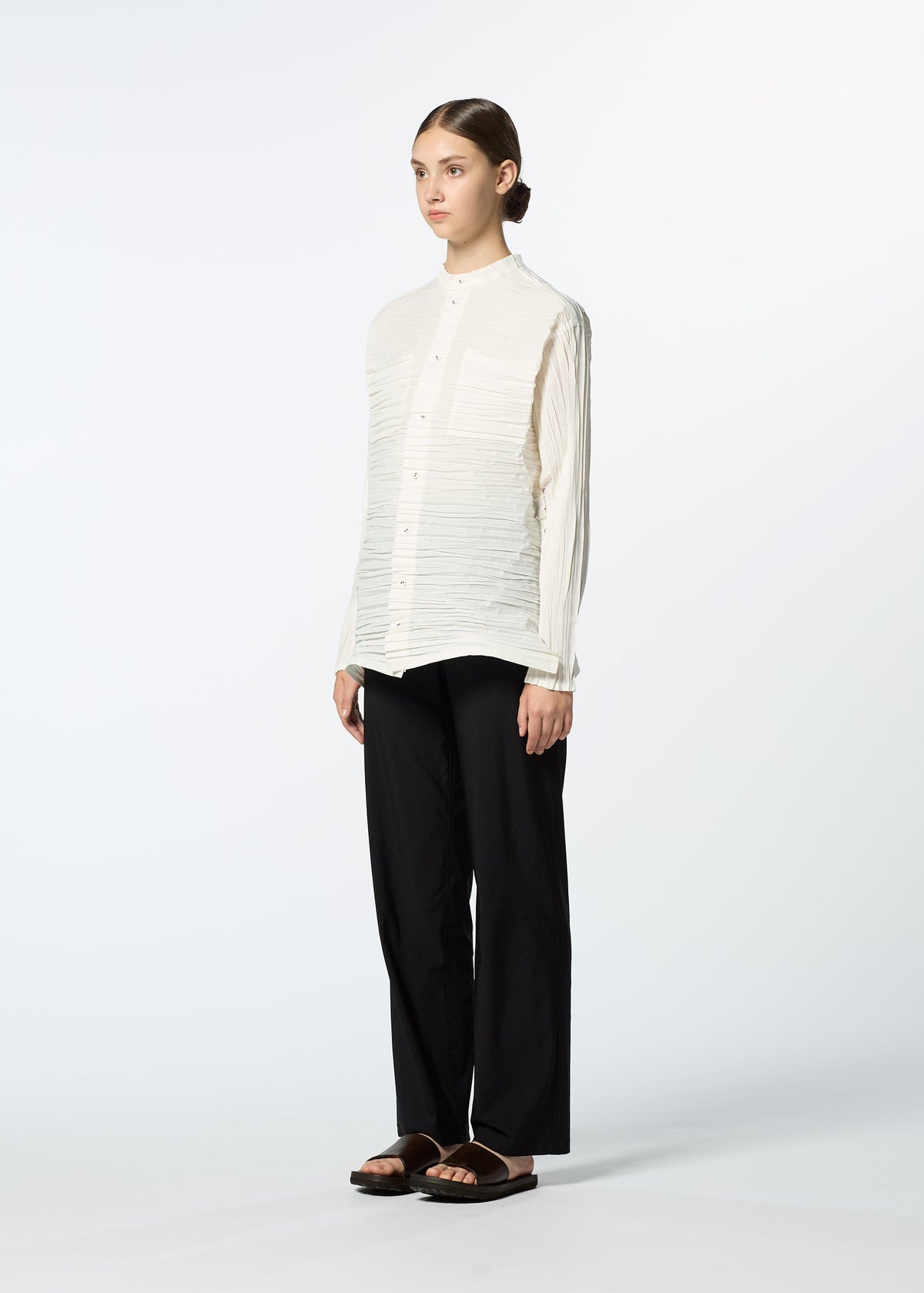 A model wears the HAAT SHIBARI SHIRT shirt.