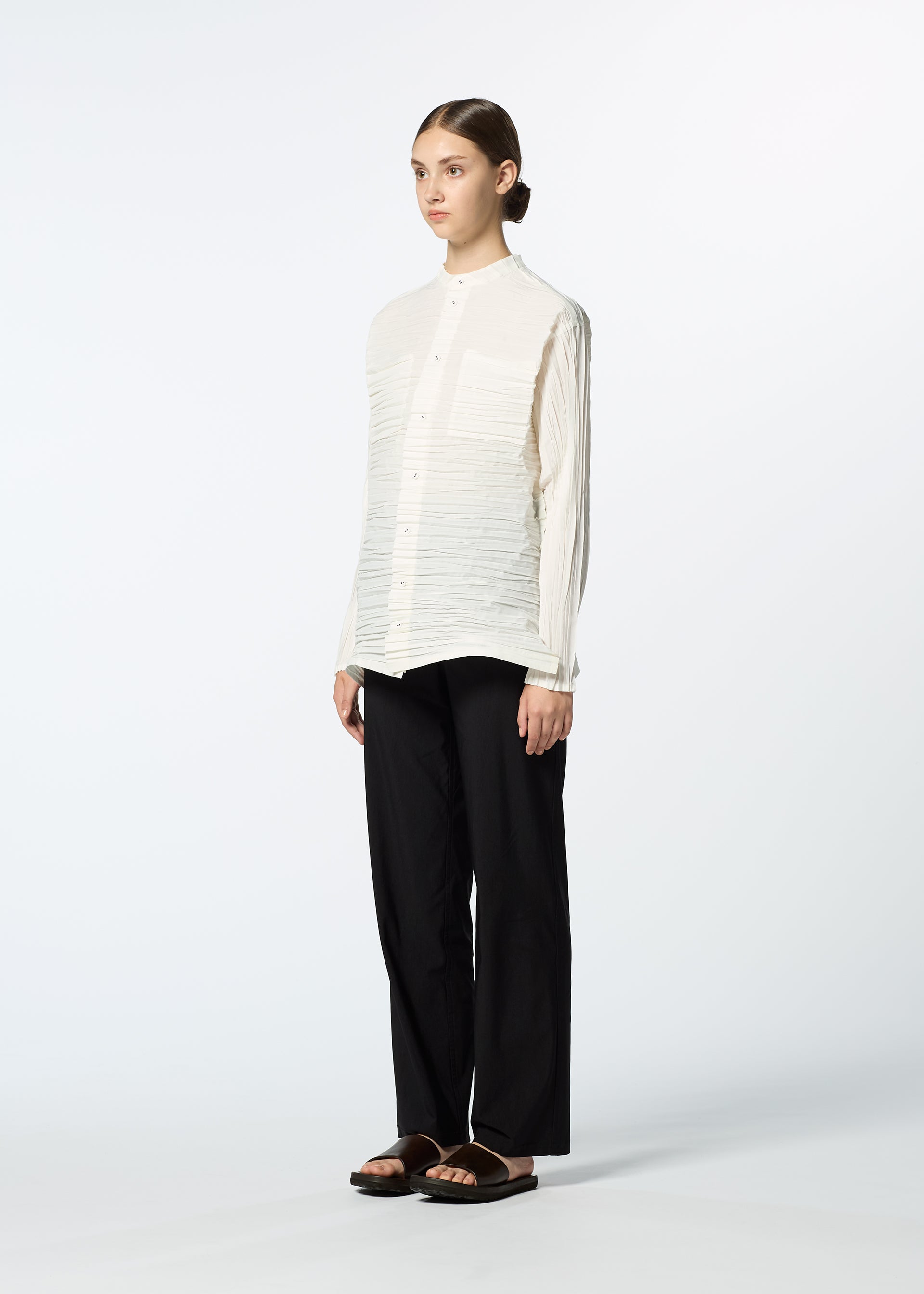 A model wears the HAAT SHIBARI SHIRT shirt.