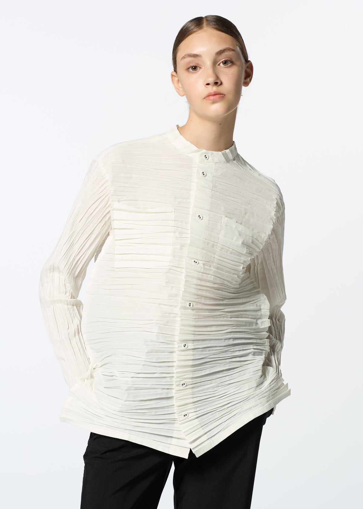 A model wears the HAAT SHIBARI SHIRT shirt.