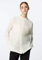 A model wears the HAAT SHIBARI SHIRT shirt.