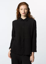 A model wears the HAAT KYO CHIJIMI 2WAY JANUARY 1 shirt.